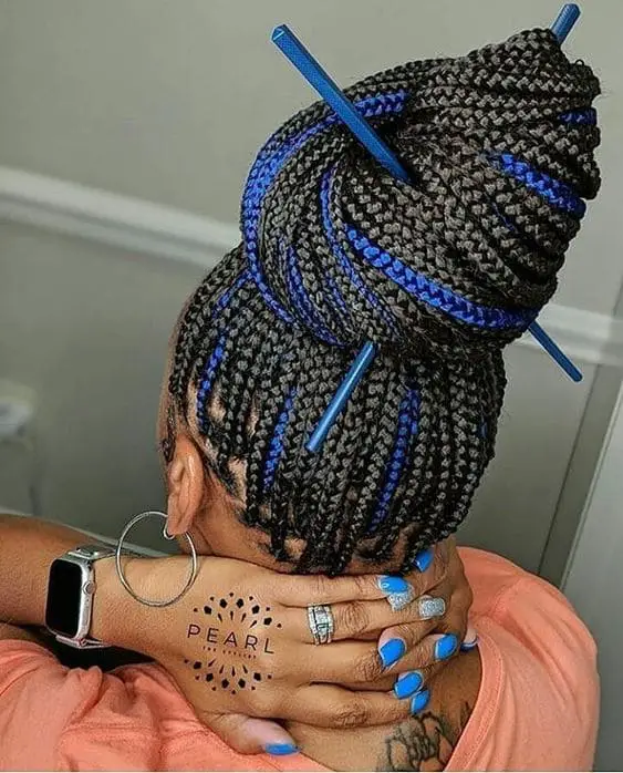 giant blue hair bun made of peekaboo braids